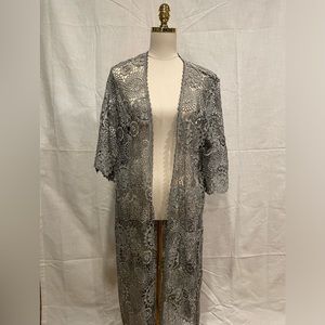 Vintage crochet duster. Anthropologie via Akemi‎ + kin